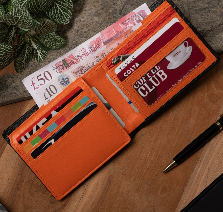 orange wallet with money